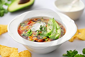 Mexican food. Chicken enchilada soup. photo