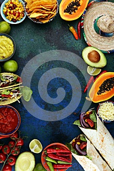 Mexican food mix with nachos copyspace frame colorful background Mexico