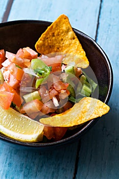 Mexican Food Pico De Gallo Salsa Salad with Tortilla Nachos, Tomato, Onion, Lime, Cilantro, Parsley, Jalapeno Pepper