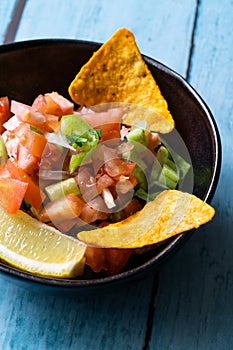 Mexican Food Pico De Gallo Salsa Salad with Tortilla Nachos, Tomato, Onion, Lime, Cilantro, Parsley, Jalapeno Pepper