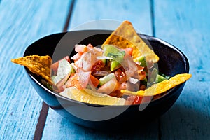 Mexican Food Pico De Gallo Salsa Salad with Tortilla Nachos, Tomato, Onion, Lime, Cilantro, Parsley, Jalapeno Pepper