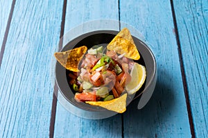 Mexican Food Pico De Gallo Salsa Salad with Tortilla Nachos, Tomato, Onion, Lime, Cilantro, Parsley, Jalapeno Pepper