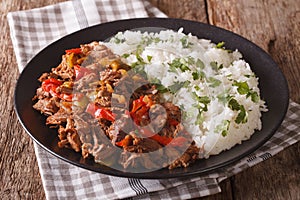 Mexican food ropa vieja: beef stew in tomato sauce with vegetabl