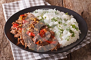 Mexican food ropa vieja: beef stew in tomato sauce with vegetabl photo