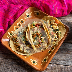 Mexican food:  Tacos of scrambled eggs with chaya