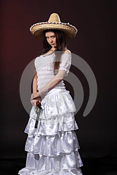 Mexican girl hold revolver