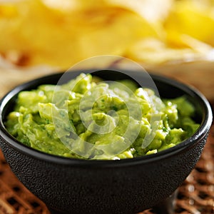 Mexican guacamole in molcajete bowl