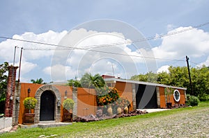 Mexican house on cobblestone street