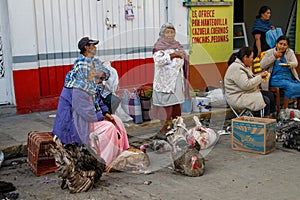Mexican indigenous people at sunday market in Oaxaca region