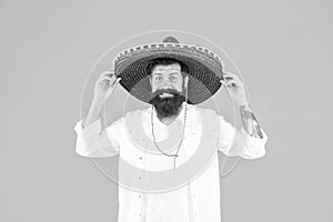 Mexican man wearing sombrero. Guy in wide brim hat. Ethnic concept. Ethnic background. Ancestry language and cultural