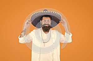 Mexican man wearing sombrero. Guy in wide brim hat. Ethnic concept. Ethnic background. Ancestry language and cultural