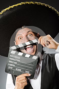 Mexican man wears sombrero isolated on white