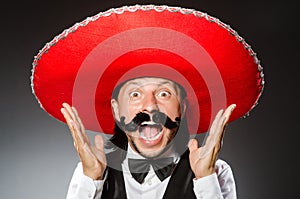 Mexican man wears sombrero isolated on the white