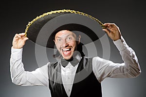 Mexican man wears sombrero isolated on the white