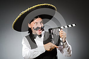 Mexican man wears sombrero isolated on the white