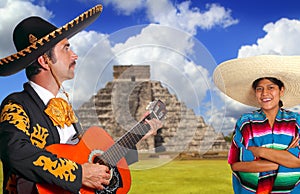 Mexican mariachi charro man and poncho Mexico girl photo