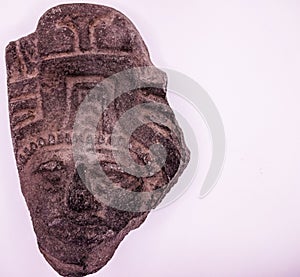 Mexican Mayan Aztec wood and ceramic mask on white background travel image Mexico Tenochtitlan, Teotihuacan