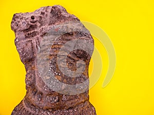 Mexican Mayan Aztec wood and ceramic mask on yellow background travel image Mexico Tenochtitlan, Teotihuacan