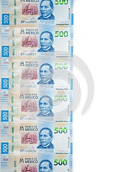 Mexican money on white background photo