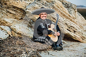 Mexican musician mariachi with guitar