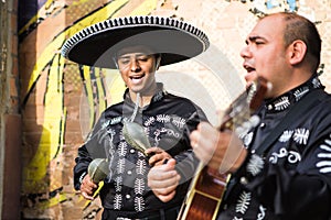 Mexican musicians in traditional costumes mariachi