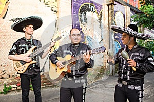 Mexican musicians in traditional costumes mariachi