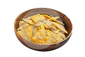 Mexican nachos corn chips in a wooden plate. Isolated on white background. Top view.