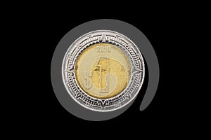 Mexican One Peso Coin Isolated On A Black Background