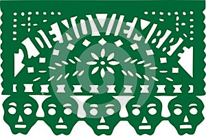 A Mexican papel picado in Spanish or pecked paper with the text November 2 skulls and a flower. photo