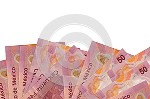 50 mexican pesos bills lies on bottom side of screen isolated on white background with copy space. Background banner template photo