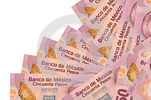 50 Mexican pesos bills lies in different order isolated on white. Local banking or money making concept photo