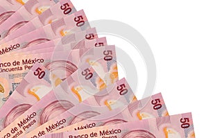 50 Mexican pesos bills lies isolated on white background with copy space stacked in fan close up photo