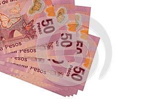 50 mexican pesos bills lies in small bunch or pack isolated on white. Mockup with copy space. Business and currency exchange photo