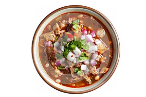 Mexican pozole soup with hominy, pork or chicken, chilies, onions, and spices in a flavorful and hearty broth