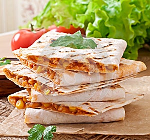 Mexican Quesadilla sliced with vegetables