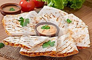 Mexican Quesadilla sliced with vegetables