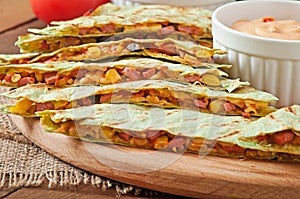 Mexican Quesadilla sliced with vegetables