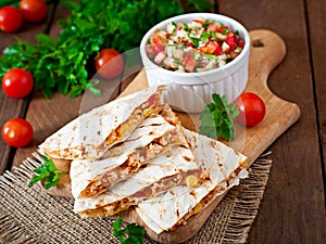 Mexican Quesadilla wrap with chicken, corn and sweet pepper