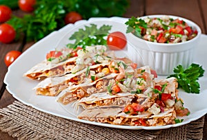 Mexican Quesadilla wrap with chicken, corn and sweet pepper