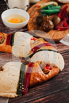 Mexican rosca de reyes or Epiphany cake ingredients and recipe on a wooden table in Mexico Latin America