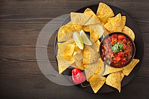 Mexican salsa dip and nachos tortilla chips