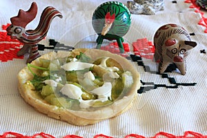 Mexican Salsa Verde Gordita and clay animals