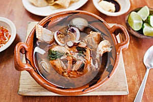 Mexican seafood soup, cazuela de mariscos in Mexico is a bowl of spicy food with shrimps and fish