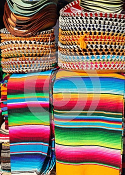 Mexican serape colorful stacked and charro hats photo