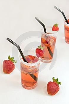 Mexican Strawberry Water - Agua de Fresa. closeup of fresh strawberry water fruit and strawberry juice isolated in white