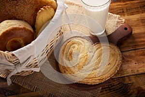 Mexican sweet bread oreja and milk photo