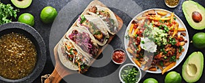 Mexican tacos and carne asada fries in panoramic wide composition