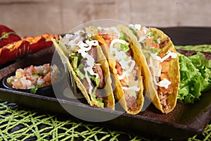 mexican tacos with guacamole jalapeno pepper salad typical tex mex cuisine