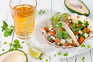 Mexican tacos with meat, sweet potatoes and cotija cheese.