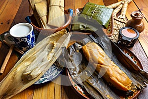 Mexican tamal in banana and corn leaf